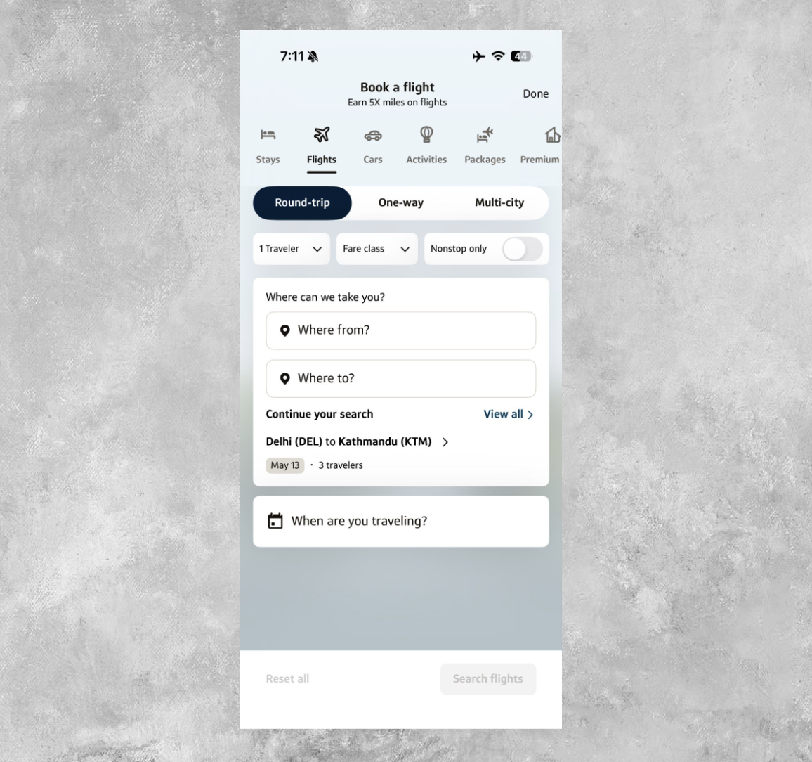Capital One Travel app flight booking widget.