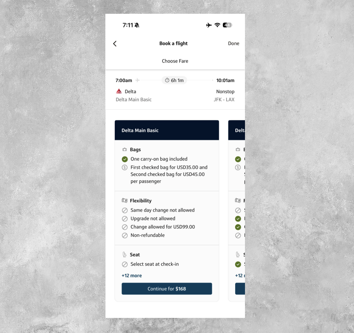 Capital One Travel app flight fare selection.
