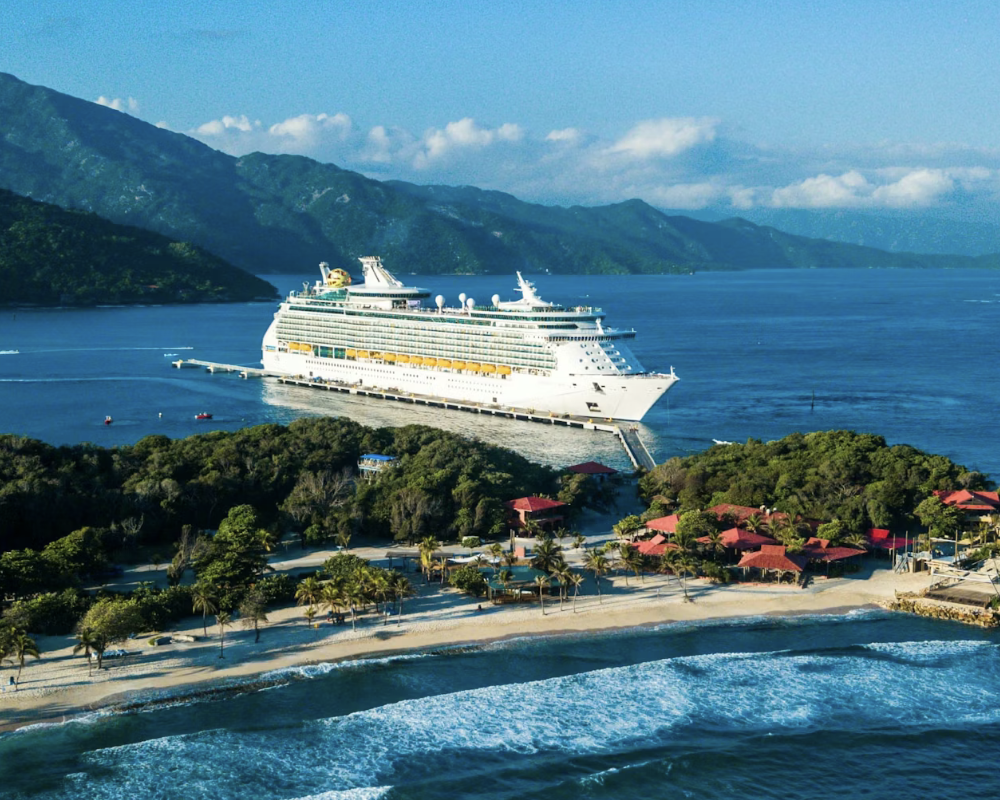 Aerial view of a Royal Caribbean cruise ship at port in the Caribbean