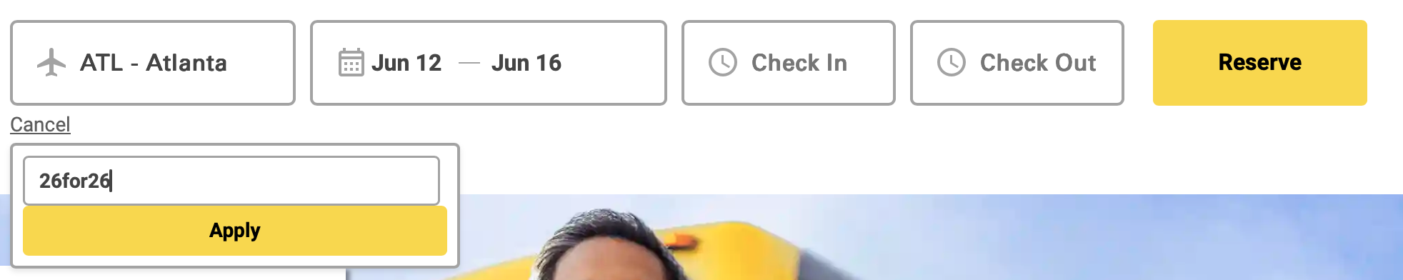 Search bar on The Parking Spot website with promo code "26for26" applied