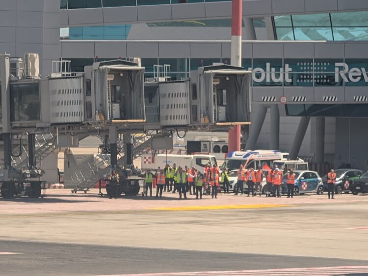 Media gathered at the gate in Rome on the arrival of Alaska's inaugural flight from Seattle to Rome