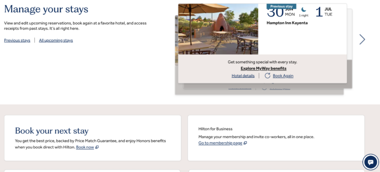 Hilton Honors profile page with chat icon on bottom right.
