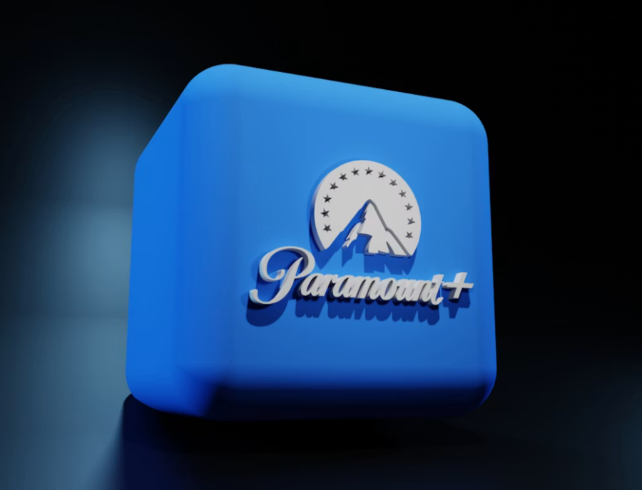 Large blue cube with the Paramount+ logo on front and a dark background. 
