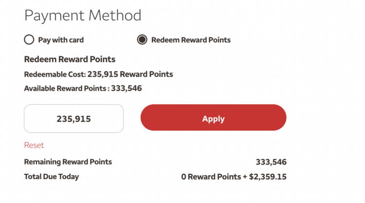 Wells Fargo Rewards travel portal payment page showing options to pay with a card or redeem rewards.
